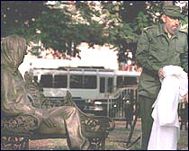 Fidel Castro unveils the John Lennon statue in Cuba.