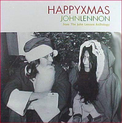 Happy Xmas Anthology Promo: John Lennon and Yoko Ono are dressed at Mr. and Mrs. Santa Claus (the photo was taken at a Christmas Party at Apple Records.